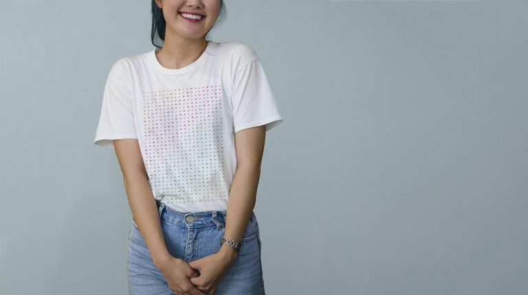 Woman with branded graphic tee